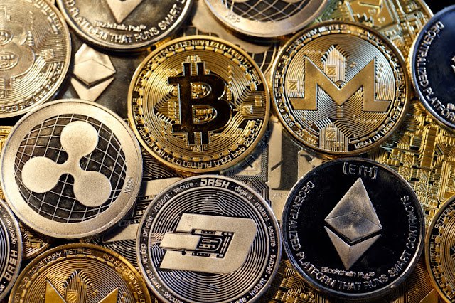 PARIS, FRANCE - FEBRUARY 16: In this photo illustration, a visual representation of digital cryptocurrencies, Bitcoin, Ripple, Ethernum, Dash, Monero and Litecoin is displayed on February 16, 2018 in Paris, France. Digital cryptocurrencies have seen unprecedented growth in 2017, despite remaining extremely volatile.  (Photo Illustration by Chesnot/Getty Images)